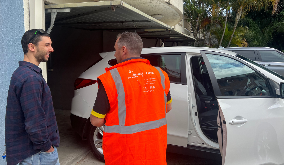 ASAP staff member speaking to a customer about pre purchase inspection